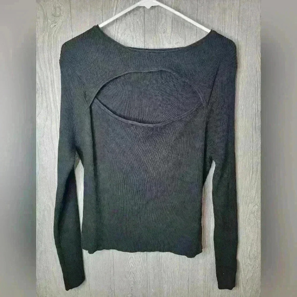 Black long sleeve shirt with peek a boo chest. No tag pit to pit size 19 inches. - Picture 1 of 4